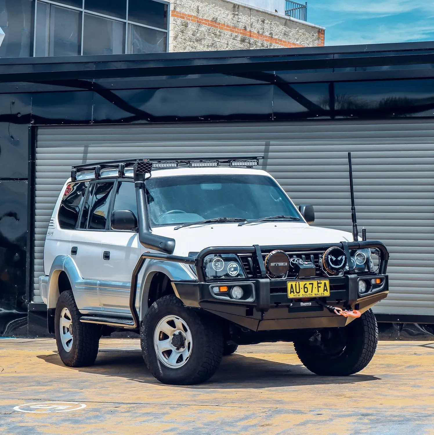 Enhanced 90 Series Prado Off-Road Frontal Pack: Heavy-Duty Bull Bar, Premium Winch, and High-Intensity LED Spotlights